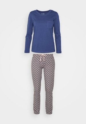 T-paita pitkillä hihoilla, tummansinisellä värillä, jossa on rintatasku, yhdistetty vauhdikkaisiin verkkareihin, joilla on beigen ja tummanruskean sävyinen sahauskuvio.