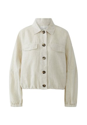 Beige cropped jas met lange mouwen, schildpaddenknopen aan de voorkant, twee borstflappenzakken, en elastische manchetten en zoom.