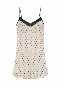Beige satin slip med svarta prickar, justerbara spaghetti-remmar och en svart spetspanel vid halsringningen. Har dekorativa knappar.