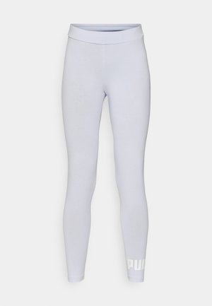Lysegrå leggings med en glat tekstur, høj talje og hvid branding på nederste venstre ben. Tætsiddende design.