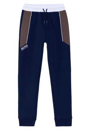 Marineblaue Jogginghose mit weißem elastischem Bund, braunen Seitenpaneelen, weißer Paspelierung, Kordelzug und "BOSS Hugo Boss"-Logo an der linken Tasche.