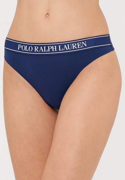 Marineblå bikiniunderdel laget av glatt stoff, med en hvit merkebånd i midjen med "POLO RALPH LAUREN" tekst. Mid-rise snitt.