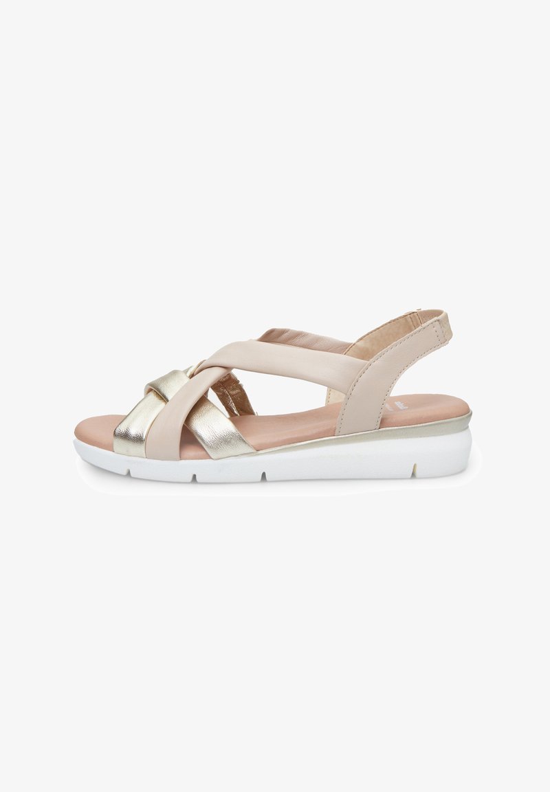 Sandali da donna in pelle beige con accenti dorati, caratterizzati da un design incrociato e una suola bianca imbottita per il comfort.