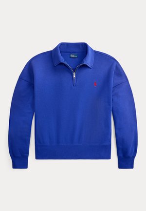 Modrý pulóver s dlhým rukávom, so zipsom na golieri a malým červeným vyšívaným logom na ľavej hrudi, rebrované manžety a pás.