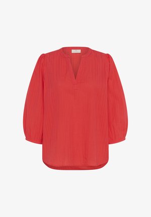 Punainen, väljä pusero, jossa on V-pääntie, kolmen neljänneksen puffihihat ja pystysuorat raidat, valmistettu kevyestä, teksturoitusta kankaasta.