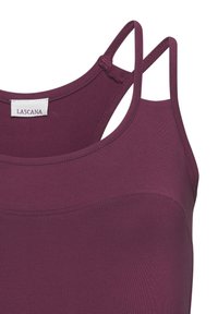 Burgundy tank top made from a soft, stretchy fabric. Features thin straps and seam detailing across the front. Label reads "Lascana."