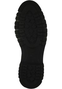 Black rubber shoe sole featuring a textured tread pattern with geometric shapes and deep grooves for traction. Size marked as 37.