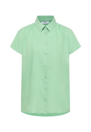 Chemise vert clair à manches courtes avec col pointu, sept boutons sur le devant et un subtil détail froncé au niveau des épaules.