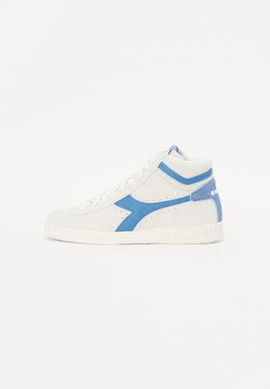 High-top sneaker made of light gray suede with blue accents. Features a white rubber sole, perforations on the sides, and lace-up design.