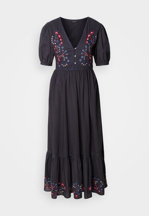 Black maxi dress with short puff sleeves, deep V-neck, featuring colorful floral embroidery on the bodice and hem. Soft, flowing fabric.