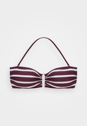 Bikini zgornji del bandeau v rdeeči in beli črtasti zasnovi z naborki in zlatim sponko v sredini. Vključuje tanke, odstranljive naramnice.