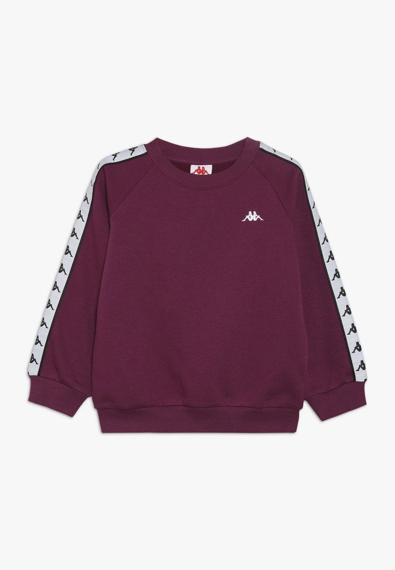 Sudadera marrón con el logo blanco de Kappa. Cuenta con mangas raglán y rayas laterales con patrón. Está hecha de un tejido suave y texturizado con un escote de patrón redondo.