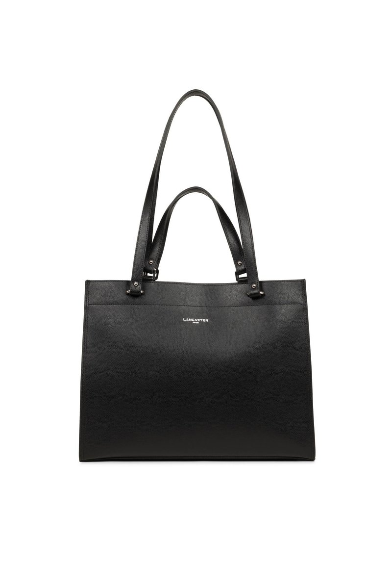Sac fourre-tout en cuir noir avec texture lisse, deux longues poignées et design minimaliste. Présente un logo argenté sur le devant.