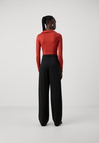ONLY Tall ONLPEACH LIFE WIDE - Stoffhose - black