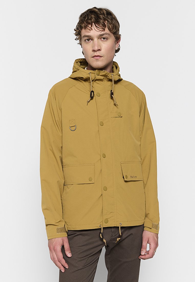 Barbour Lichte jas okergeel Barbour Lichte jas okergeel