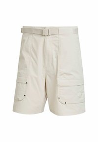 Bež cargo šortsevi s dva bočna džepa, elastičnom sredinom i podesivim remenom. Izrađeni su od laganog materijala s teksturiranim završetkom.