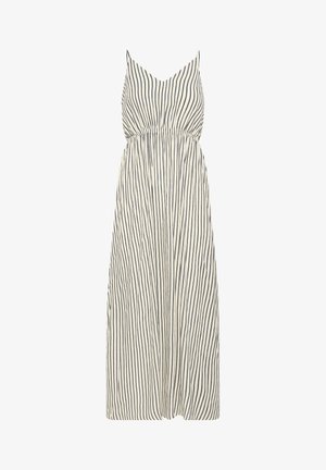 Long sleeveless dress with thin black vertical stripes on a white background and a gathered waist.