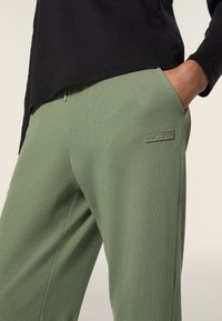 Freddy JOGGERS - Pantalones deportivos - hedge green