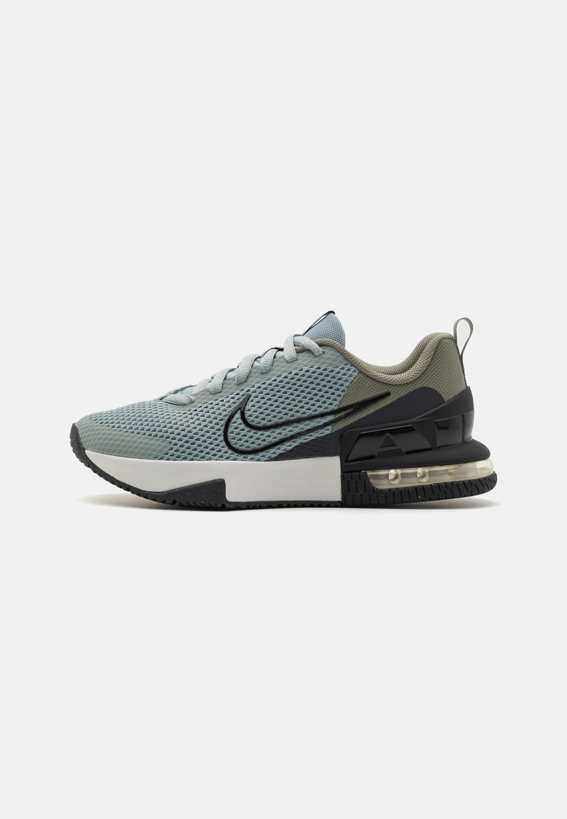 Mesh athletic shoe in light blue with black accents, textured upper, round toe, laces, and air cushioning in the heel. Rubber sole.