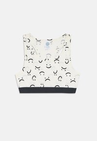 Krémový crop top s vzorom čiernych usmievajúcich a mrzúskych tvárí, so kontrastným čiernym elastickým pásom na spodnej časti.
