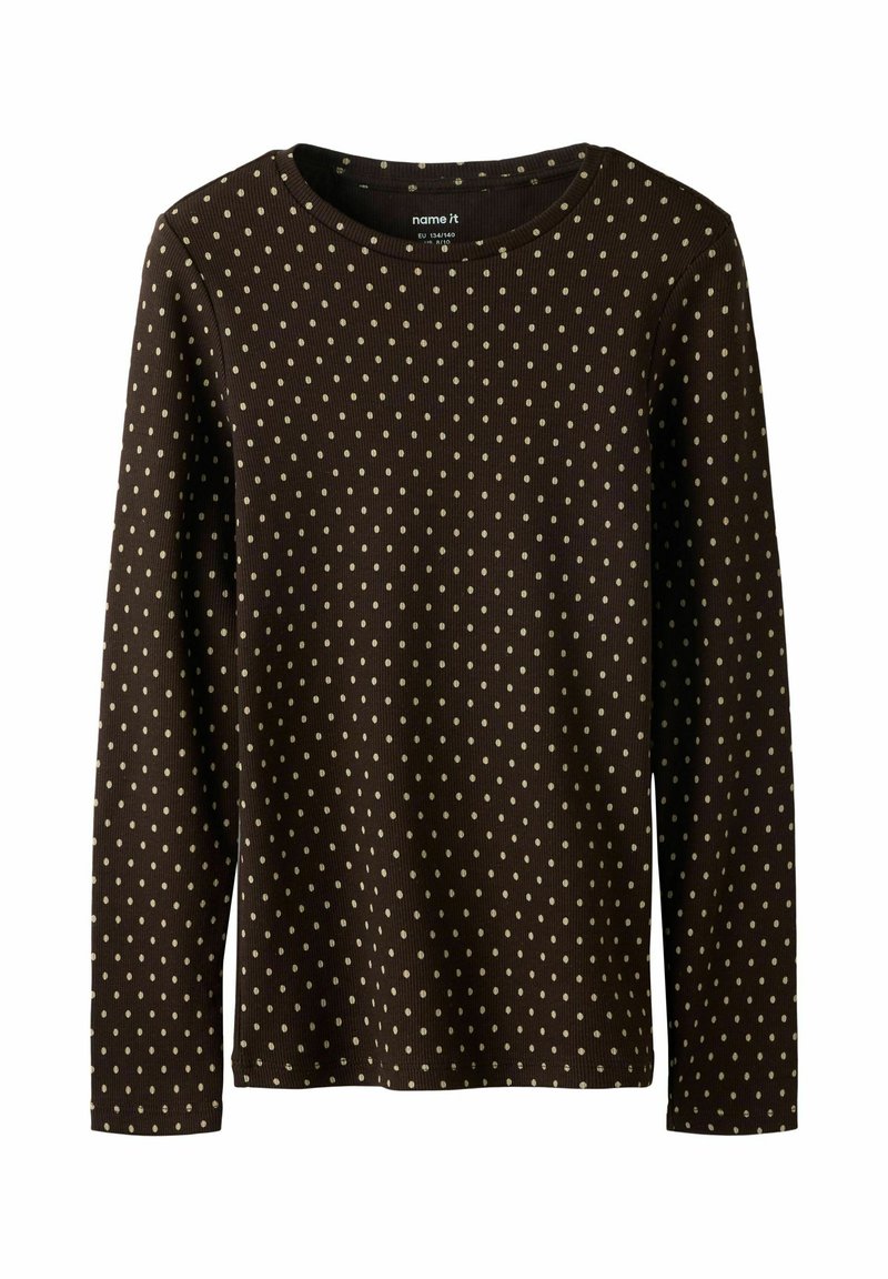 Brun langermet skjorte laget av ribbestrikket stoff, med et gjentatt mønster av prikker i lyse beige. Rund halsutringning, med vanlig passform.