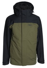 Veste extérieure bicolore verte et noire avec capuche, fermeture éclair complète à l'avant et logo Jack Wolfskin sur la poitrine.