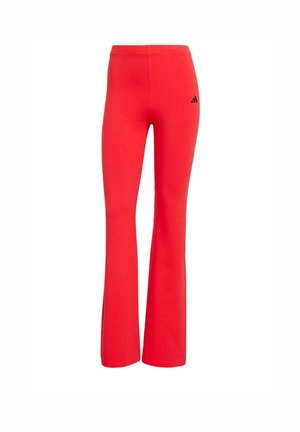 Red flared leggings made of stretchy fabric, featuring a black Adidas logo on the back and a smooth texture with a fitted silhouette.