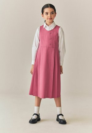 Next, ASYMMETRIC BUTTON FRONT LONG PINAFORE SCHOOL DRESS.  - REGULAR FIT - Abito a camicia - pink