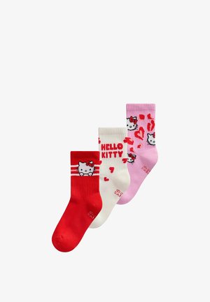 Drei Paar Kinderstrümpfe in Rot, Weiß und Pink, verziert mit Hello Kitty-Gesichtern, Herzen und dem Schriftzug "HELLO KITTY".