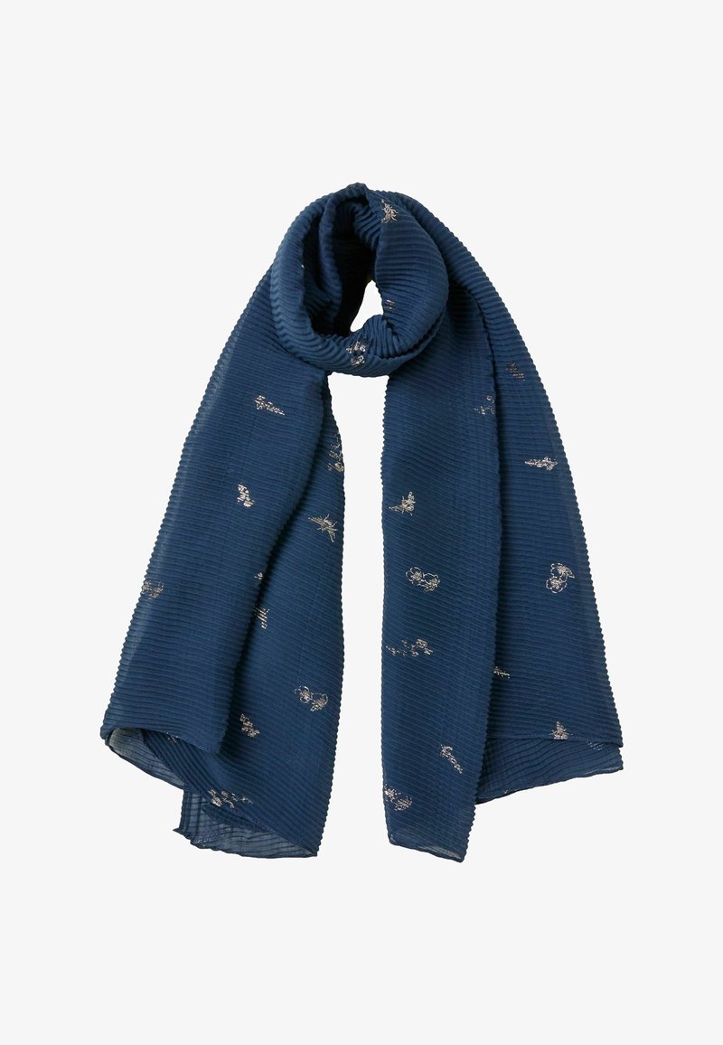 Laivastonsininen ribbineulottu huivi, jossa on pieniä hopeisia kukkaompeleita, ylhäältä löyhästi taiteltu.