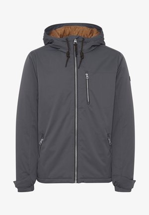 Szara kurtka z brązowym wnętrzem, z kapturem ze sznurkiem, przednimi zamkami błyskawicznymi i dwoma kieszeniami po bokach. Gładki, odporny na warunki atmosferyczne materiał.