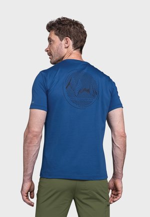 Blaues T-Shirt mit kurzen Ärmeln und rundem Ausschnitt, mit einem grafischen Muster auf dem Rücken, das wellenförmige Linien innerhalb eines Kreises zeigt.