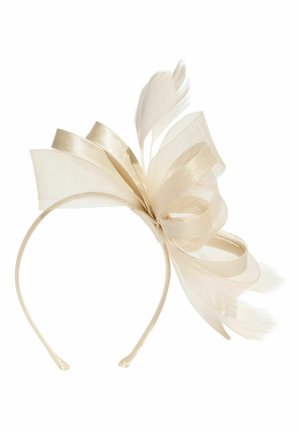 Beige satin headband with large mesh bow and delicate feathers arranged in an elegant decorative design.