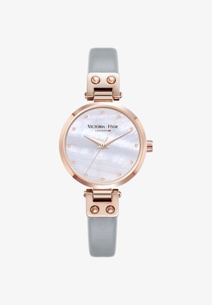 Rund ur med rosaguldet kasse, perlemorsskive og grå læderrem. Har minimalistiske timemarkører og metalliske accenter.