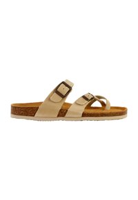 Beige Sandalen mit zwei verstellbaren Riemen, Korkfußbett und strukturiertem Profil. Minimalistisches Design mit Schnallenakzenten und flachem Profil.