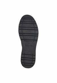 Semelle de chaussure en caoutchouc noir avec un motif hexagonal texturé, présentant des rainures profondes pour une traction et une marque estampée "S. OLIVER" taille 37.