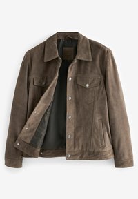 Bruine nubuck leren jas met een klassieke kraag, drukknoopsluiting, twee borstzakken en zijzakken. Heeft een soepele voering aan de binnenkant.
