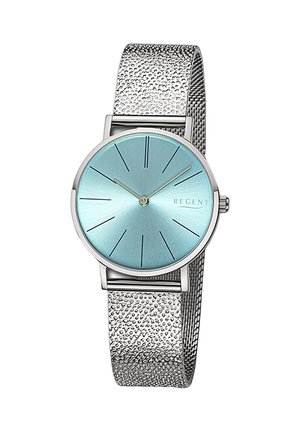 Montre avec bracelet en maille argentée et cadran rond bleu clair, marqueurs d'heure minimalistes et aiguille des secondes centrale dorée. Nom de la marque "REGENT" affiché.