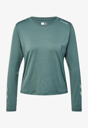 Langärmliges Hemd in gedämpftem Grün, aus glattem Stoff gefertigt. Verfügt über ein dezentes Logo an der Schulter und ein helles Zickzackmuster an den Ärmeln.