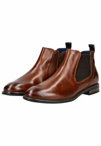 Bottines Chelsea en cuir marron avec des panneaux latéraux élastiques, une finition lisse, un bout arrondi et un petit talon empilé.