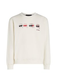 Crème sweatshirt met een ronde hals, lange mouwen en een voorzijde met een grafiek van geïllustreerde gezichten die zonnebrillen dragen in rood en zwart.