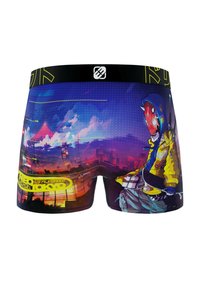Des boxers pour hommes vibrants présentent un design de paysage urbain avec des couleurs néon, représentant un personnage en veste jaune, accentué de motifs numériques.