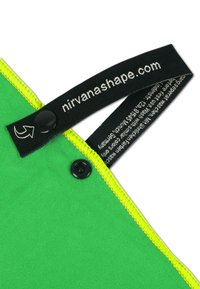 Green microfiber fabric with a textured surface; features yellow stitching and a black tag with white text and a button closure.