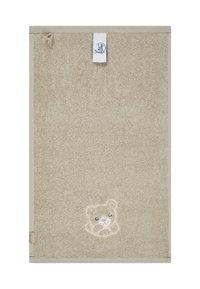 Beige towel with textured surface, featuring a small embroidered bear design in the lower section and a hanging loop at the top.