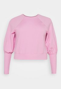 Różowy krótki sweter z długimi rękawami, w stylu raglanowym, z detalami puffed sleeves. Wykonany z miękkiego materiału bawełnianego o gładkiej fakturze.