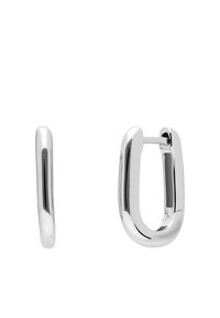 Boucles d'oreilles en argent poli en forme de U, avec des contours lisses et un fermoir à charnière. Légères et finition brillante.