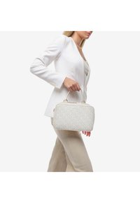 Miriade SOLANA - Borsa a mano - off white
