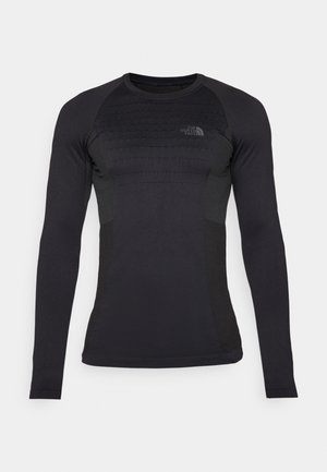 Long-sleeve, fitted black athletic shirt with textured paneling, round neck, and logo on the upper left chest. Made of stretchy, moisture-wicking fabric.