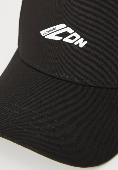 Black cap with a structured design made of smooth fabric. Features white "DSQUARED2" logo on the front. Stitched detailing on the brim.