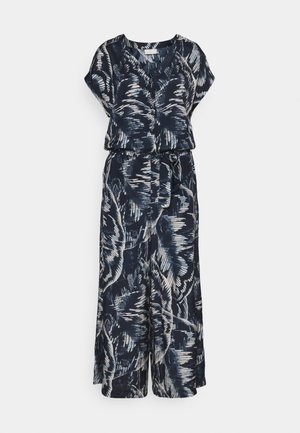 Marineblå jumpsuit med korte ærmer, V-hals, knapfront, bindebælte og abstrakt hvid penselstrøgs mønster.